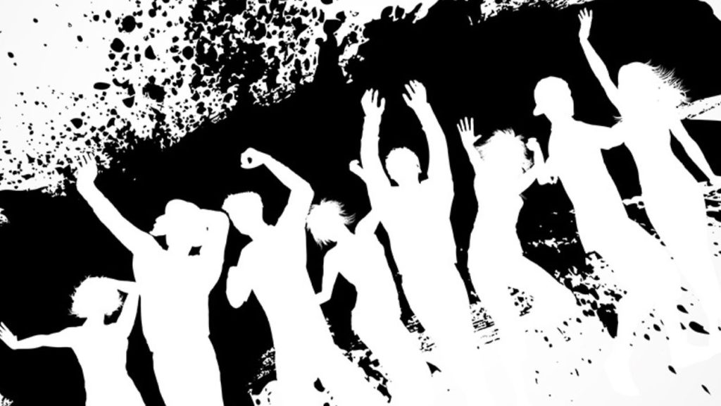 Graffiti avec des personnes levant les bras